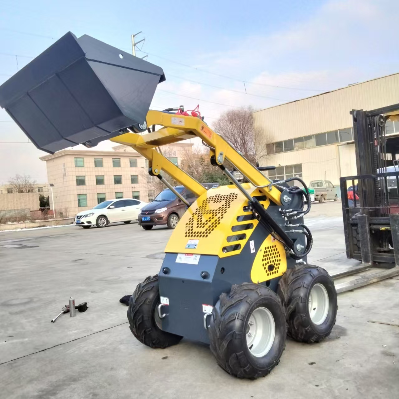 380E skid steer loader four-wh - đánh giá và giá Wheel Loader